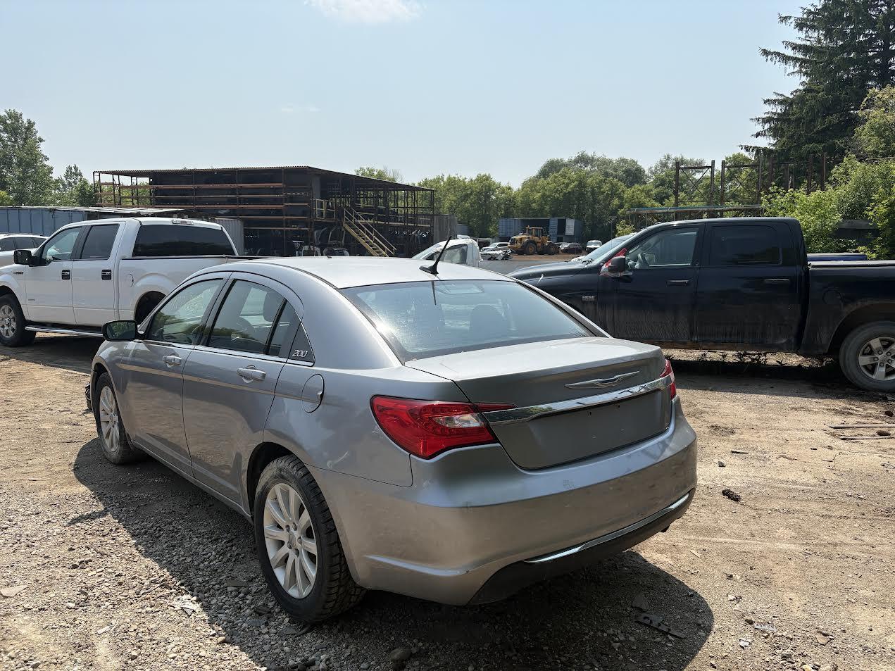Used OEM Driver Side Tail light fits 2011-2014 Chrysler 200 5182525AE