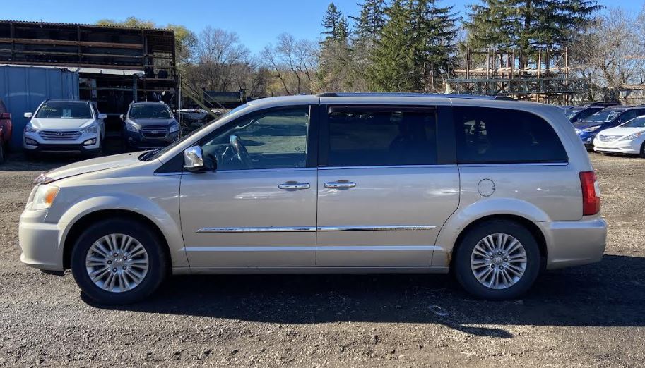 Used OEM A/V Equipment fits 2012 Dodge Caravan, Chrysler Town & Country 05091209AC