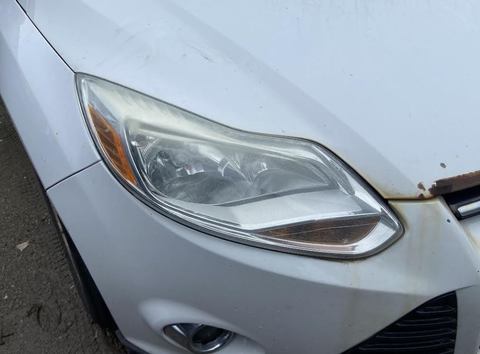 Used OEM RH Headlight fits 2012-2014 Ford Focus BM5Z13008F