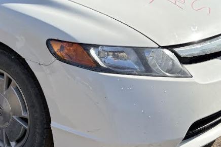 Used OEM RH Headlight fits 2006-2008 Honda Civic 1.8L, 2007-2008 Honda Civic 2.0L 33101SNAA02