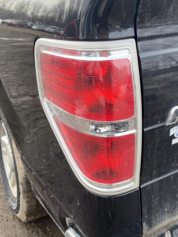 Used OEM LH Taillight fits 2009-2014 Ford F150 Pickup BL3Z13405B