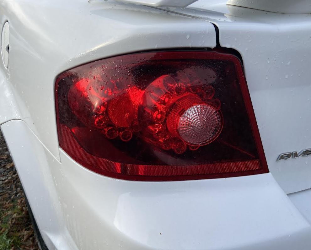 Used OEM LH Driver Side Taillight fits 2011-2014 Dodge Avenger 5182523AG