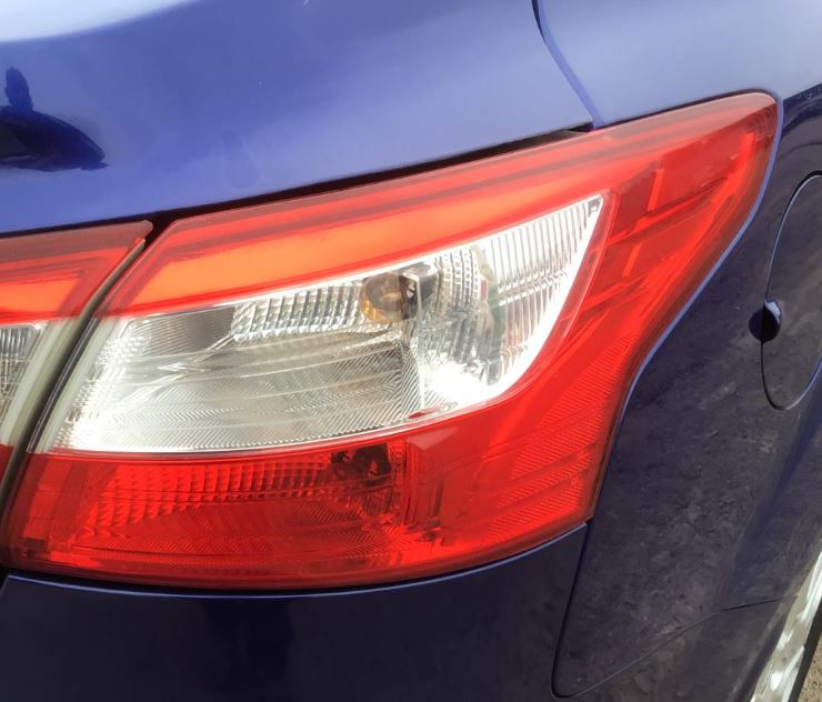 Used OEM RH Taillight fits 2012-2014 Ford Focus DM5Z13404E