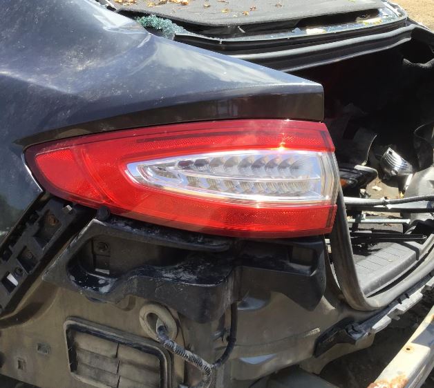 Used OEM LH Driver Side Taillight fits 2013-2016 Ford Fusion DS7313405AA DS7313405AB DS7Z13405C