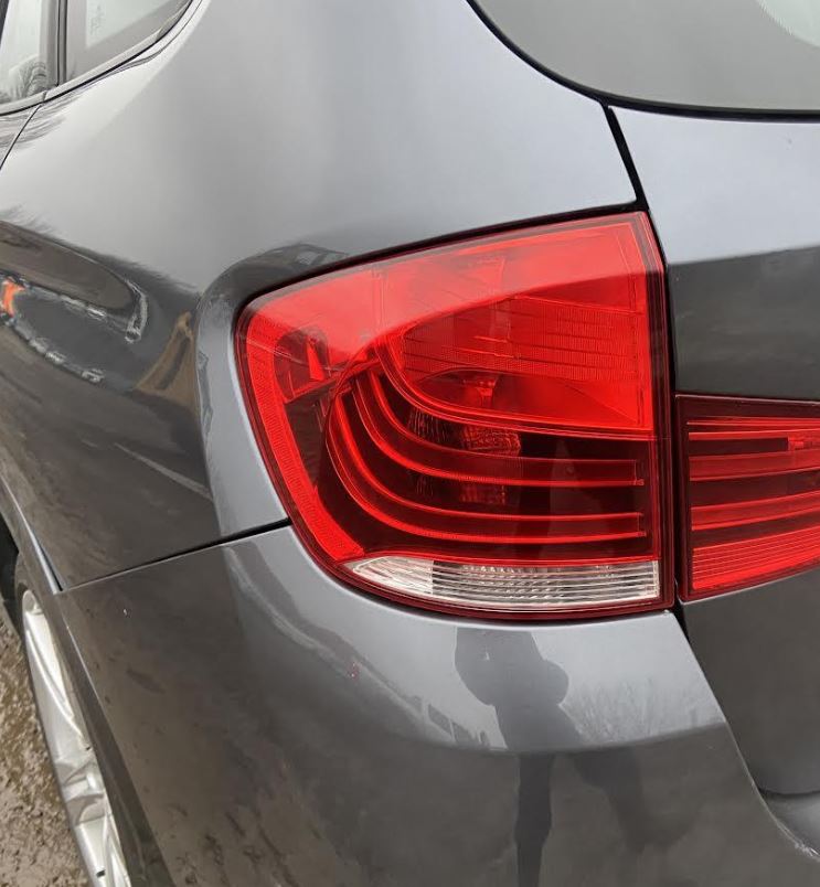 Used OEM LH Driver Side Taillight fits 2012-2015 BMX X1 63212990111