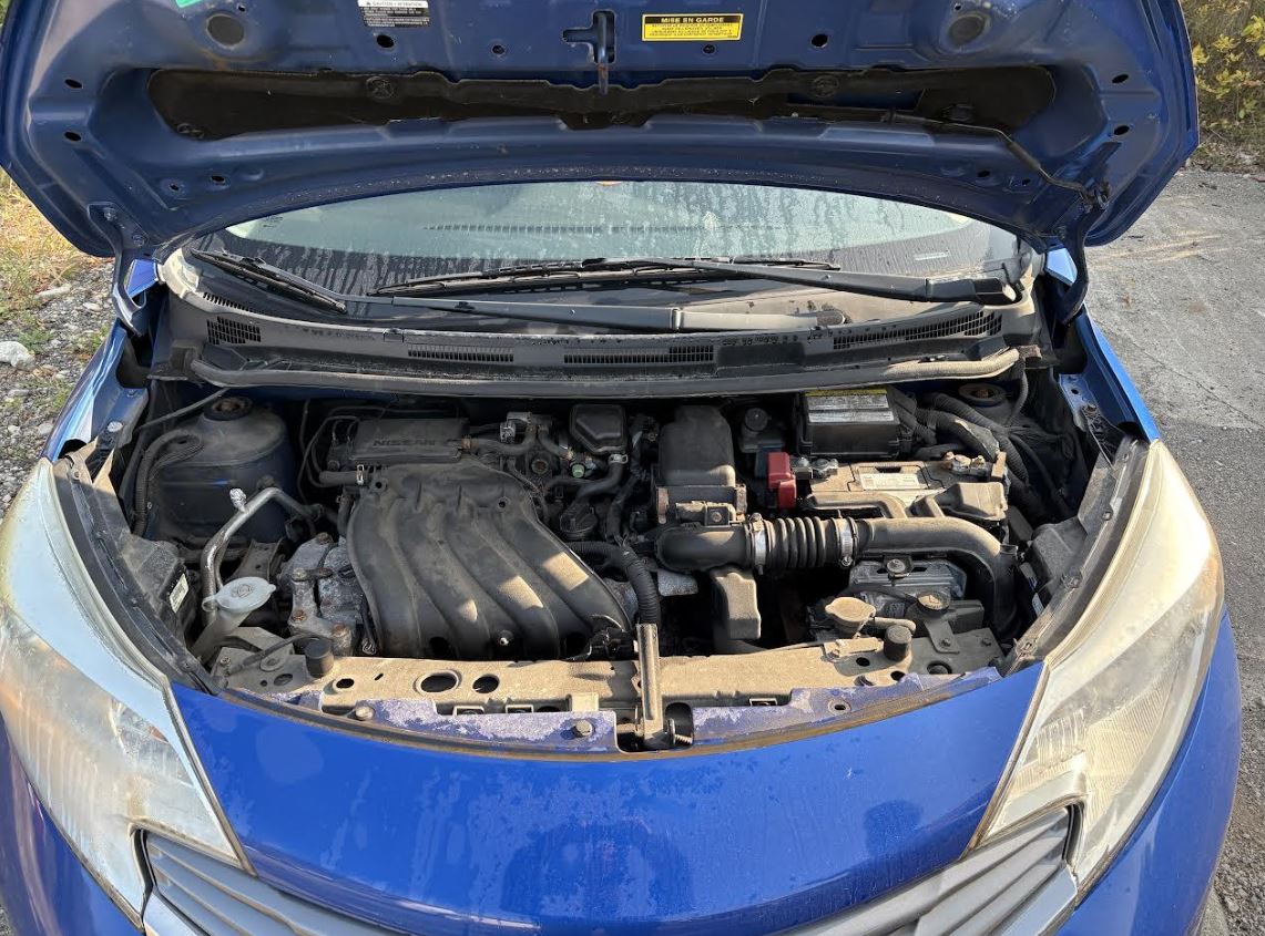 Démarreur d'origine d'occasion compatible avec Nissan Versa 2012-2014 (références : 233001HK0C et 233001HK0A).