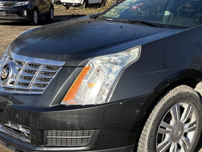 Used OEM LH HID Headlamp fits 2010-2016 Cadillac SRX 23481296
