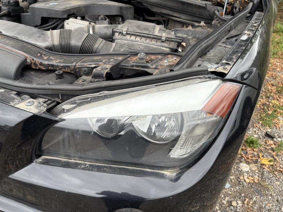 Used OEM RH Passenger Side Headlight fits 2012 BMW X1 63112990005