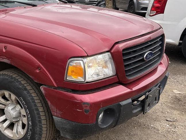Used OEM RH Passenger Headlight fits 2001-2011 Ford Ranger 6L5Z13008AA