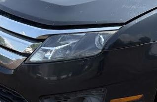 Used OEM LH Passenger Side Halogen Headlight fits 2010-2012 Ford Fusion