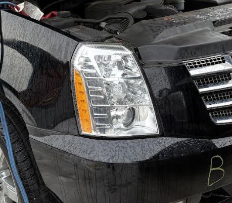 Used OEM RH HID Headlight fits 2009-2014 Escalade, 2010-2014 Escalade ESV, 2009-2013 Escalade EXT