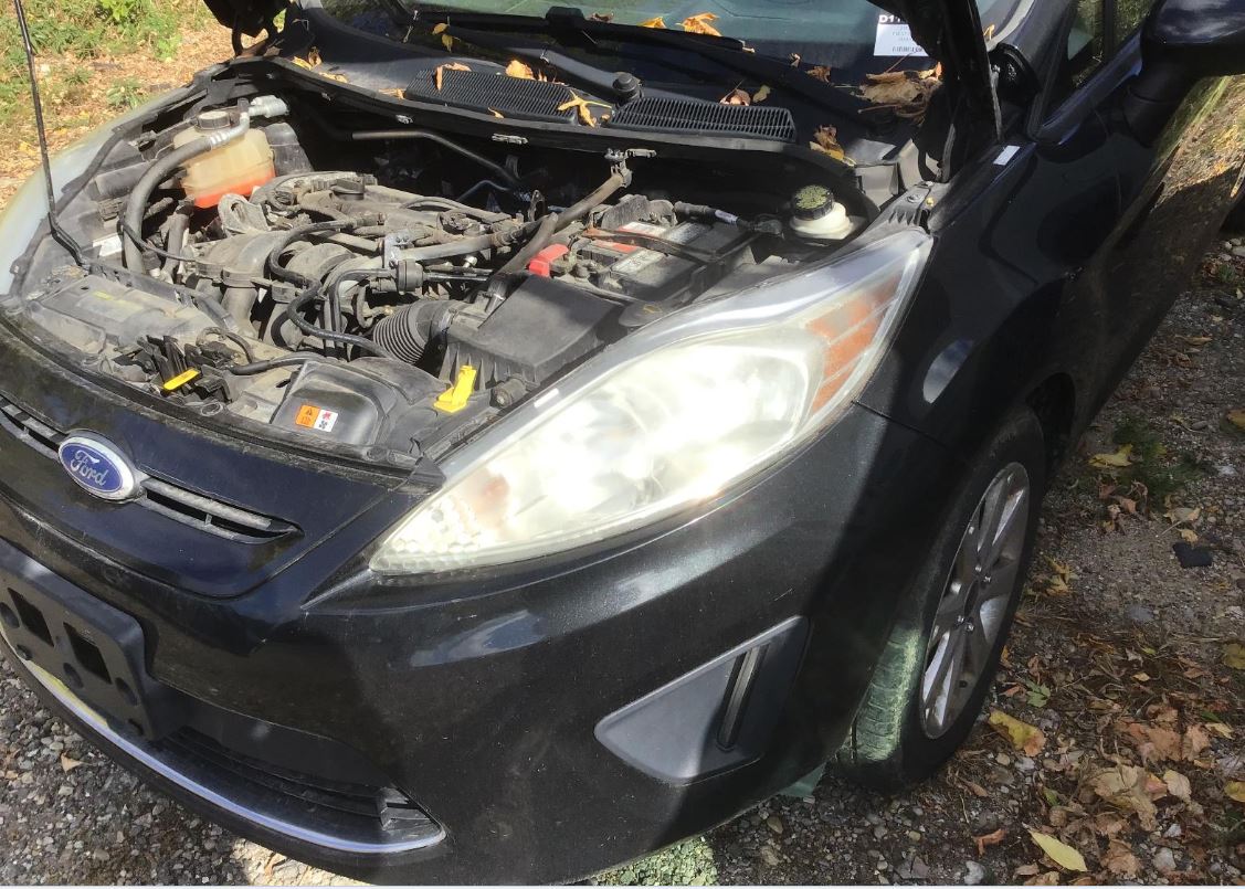 Used OEM Driver Side Head light fits 2011-2013 Ford Fiesta BE8Z13008B