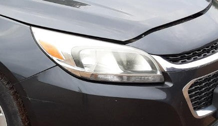 Used OEM Passenger Side Head light fits 2013-2016 Chevrolet Malibu 23294936