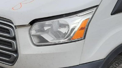 Used OEM LH Driver side Headlight fits 2015-2019 Transit 150/250/350 (Chrome Trim), 2020-2023 Transit 150/250/350 (Halogen, Chrome Trim) CK4Z13008M CK4113W030BM