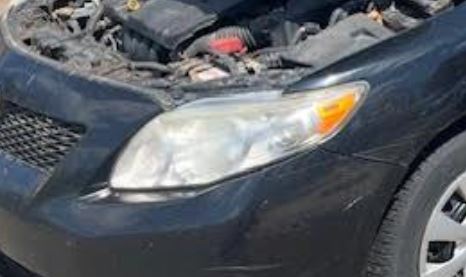 Used OEM LH Driver side Headlight w/o black trim fits 2009-2010 Toyota Corolla 8115002670