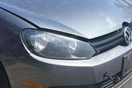 Used OEM RH Passenger side Halogen Headlight fits 2010-2014 Volkswagen Jetta/Golf 5K0941006D