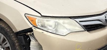 Used OEM RH Chrome Trim Headlight fits 2012-2014 Toyota Camry 8111006470