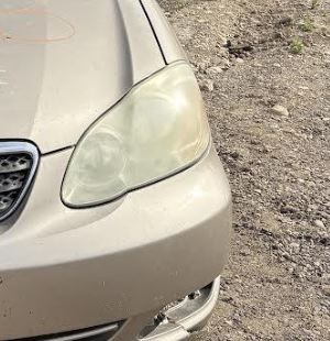 Used OEM Driver Side Headlight fits 2004-2008 Toyota Corolla 8115002350