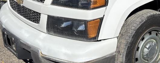 Used OEM LH Driver Side Headlight fits 2004-2012 Canyon/Colorado 20766569