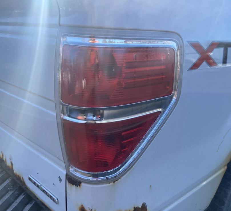 Used OEM RH Taillight fits 2009-2014 Ford F150 Pickup BL3Z13404B