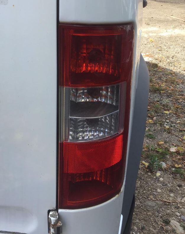 Used OEM RH Taillight fits 2010-2013 Transit Connect 9T1Z13404A