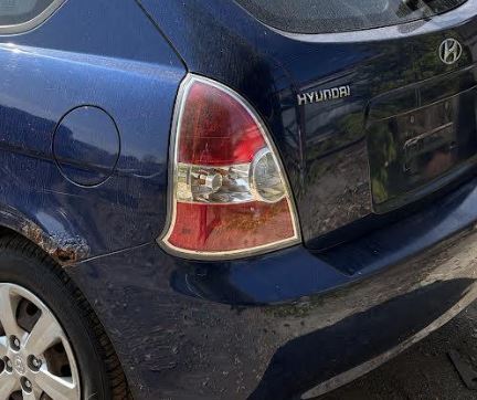 Used OEM LH Driver Side Outer Taillight fits 2008-2011 Hyundai Accent 924011E211