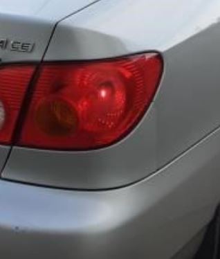 Used OEM RH Taillight fits 2003-2004 Toyota Corolla 8155002200